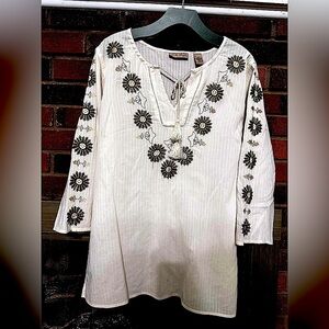 Relaxed fit embroidered top. Excellent condition.